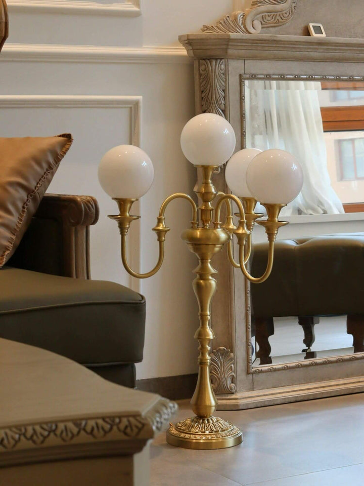 Solora brass table light with three globes, perfect mid century modern table lamp for living room decor.