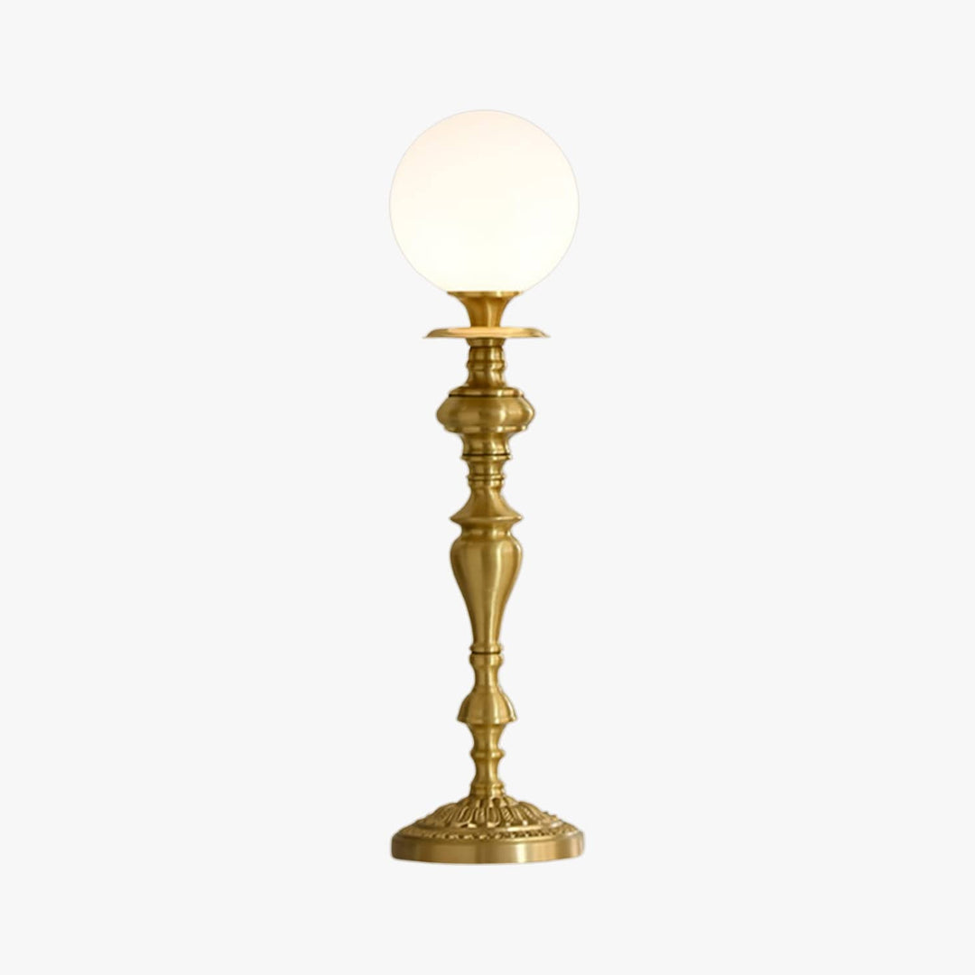 Solora Table Light: vintage brass lamp with white globe, perfect table light for living room decor.