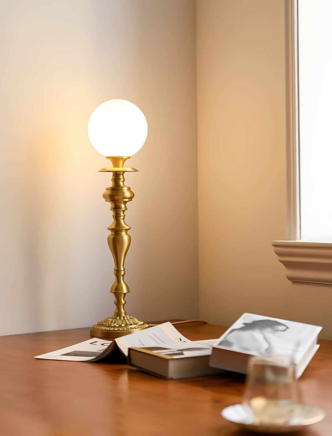 Solora Table Light in brass with a glass orb, perfect for vintage decor and table lights for living room.