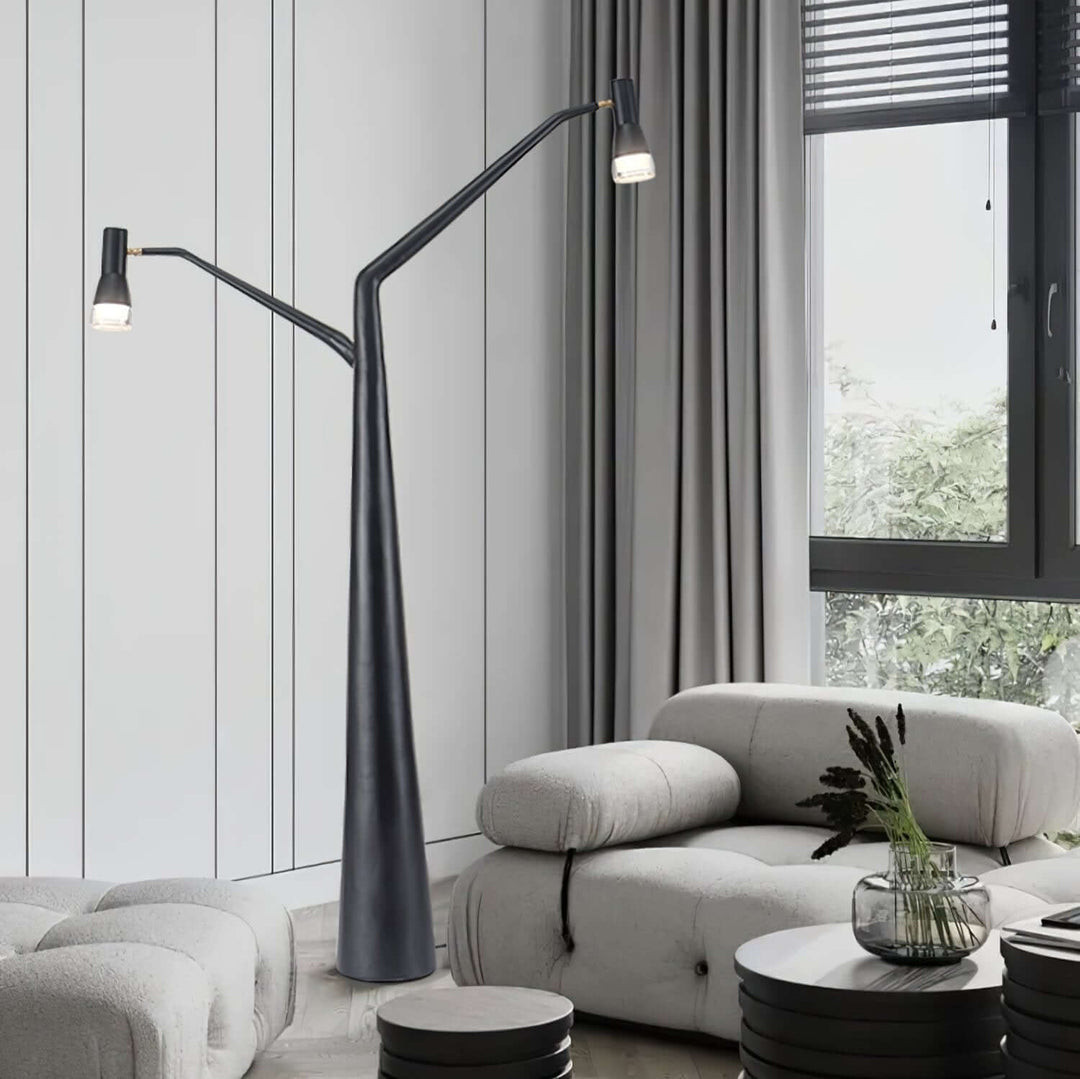 Soma Y-Floor Lamp in a modern living room, showcasing its unique sculptural design and stylish illumination.