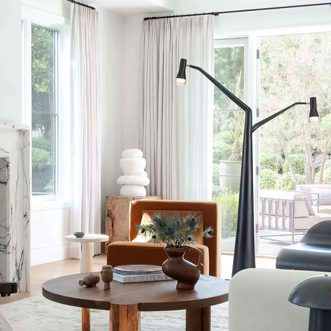 Soma Y-Floor Lamp in contemporary living room, showcasing a sculptural design and stylish ambiance for modern decor.