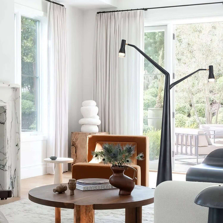 Soma Y-Floor Lamp in contemporary living room, showcasing a sculptural design and stylish ambiance for modern decor.