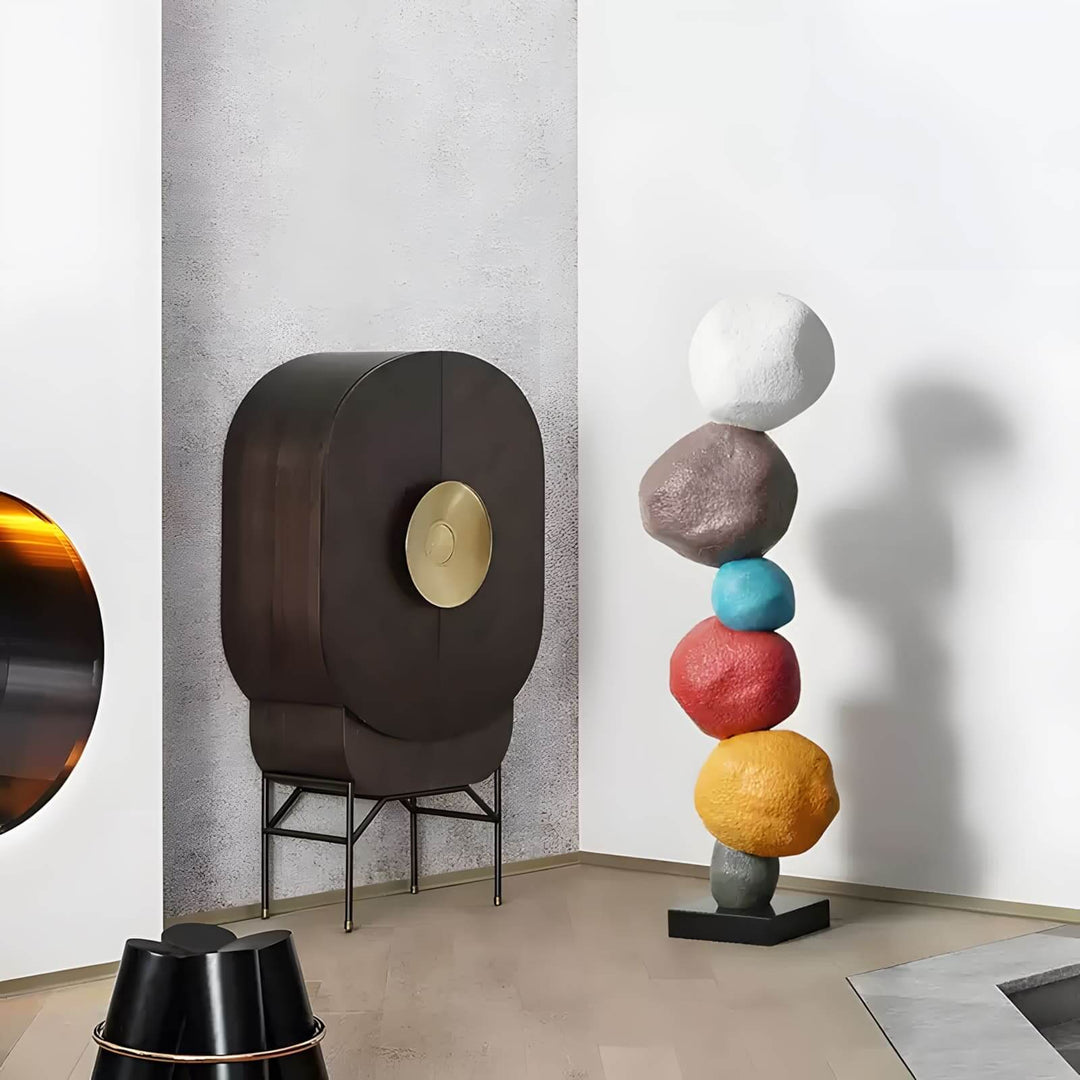 Colorful stacked stone sculpture as a stylish living room decoration, featuring Art Deco design elements.