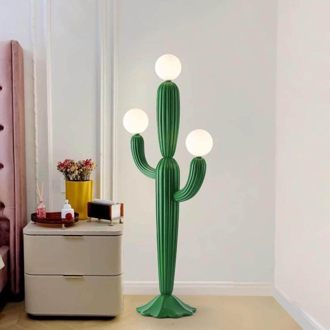 Stylish cactus floor lamp in green, featuring three globes, perfect for art deco and modern interior decor.