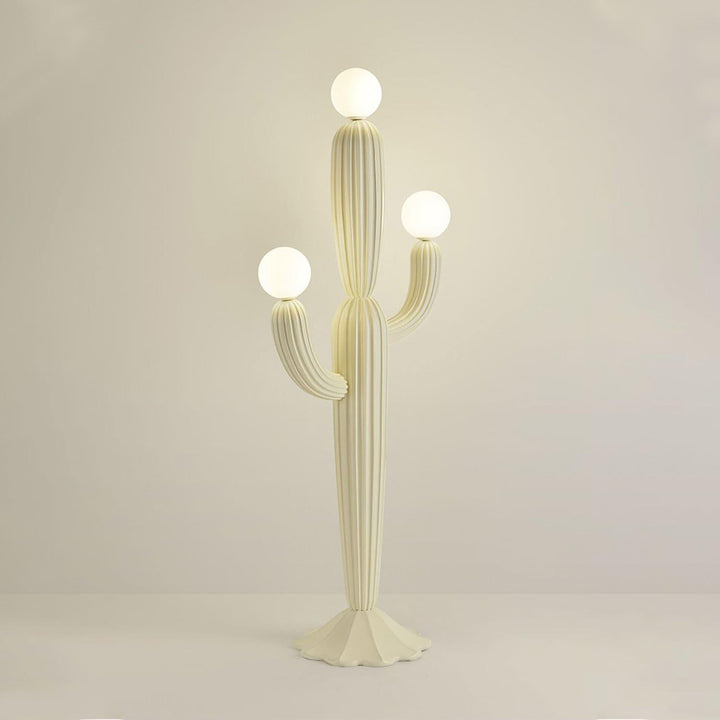 Sculptural cactus floor lamp with three light globes, perfect for adding an art deco touch to any room.
