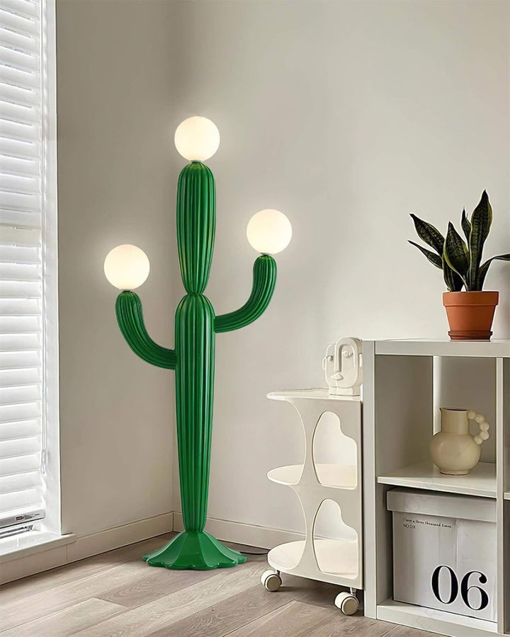 Modern green cactus floor lamp with three spherical lights, ideal for adding a sculptural touch to your art deco decor.