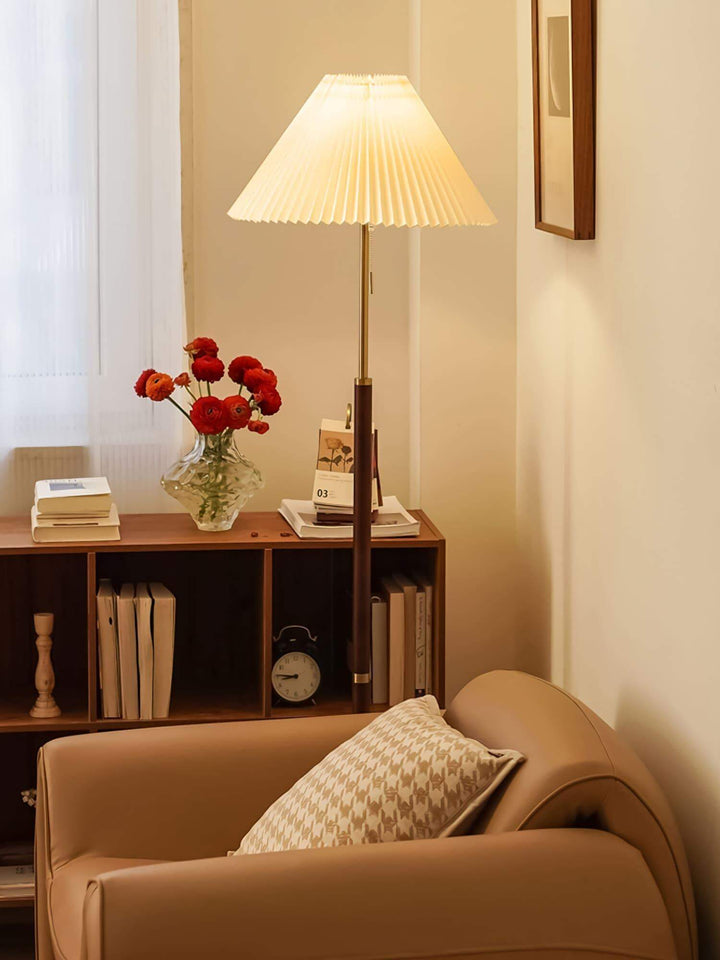 Suki Pleated Floor Lamp in a cozy living room, ideal as a wooden, mid-century modern, or behind sofa lamp.