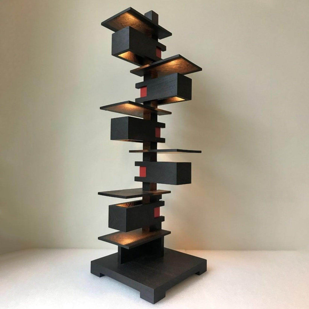 Taliesin table lamp featuring a unique wood design, ideal for living room decor with an art deco style.