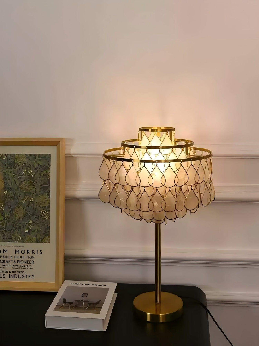 Teardrops shell table lamp with brass accents, perfect for coastal bedside lighting and luxury decor.