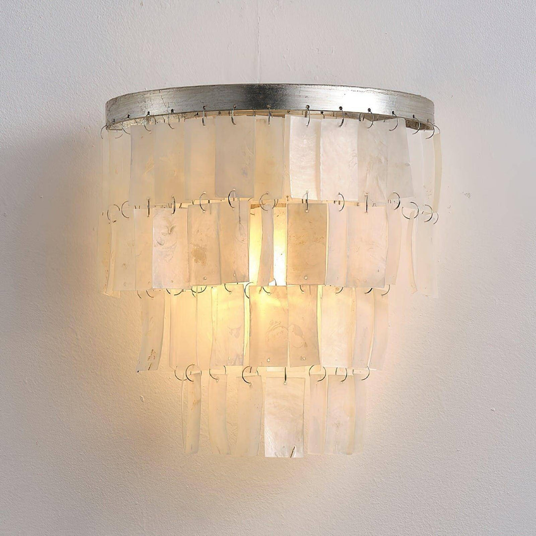 Coastal shell wall sconce in a tiered design, perfect for bedside wall lights, measuring Dia 25cm x H 25cm.