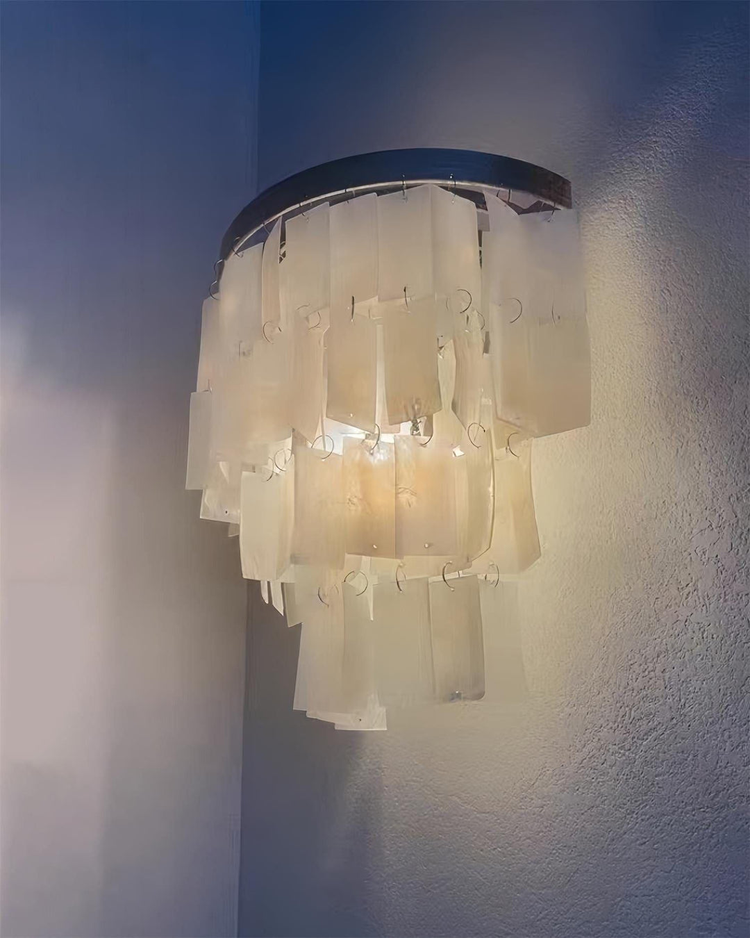 Tiered wall lamp designed as a coastal shell wall sconce, perfect for bedside wall lights and modern decor.
