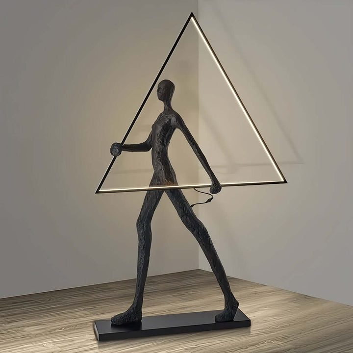 Tivoro Triangle Floor Lamp, a resin sculpture combining Art Deco design with stylish living room decoration.