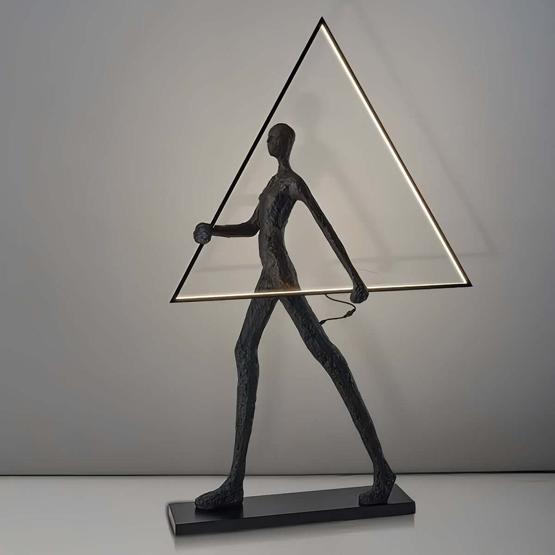 Tivoro Triangle Floor Lamp featuring artistic resin sculpture in Art Deco style, perfect for living room decorations.