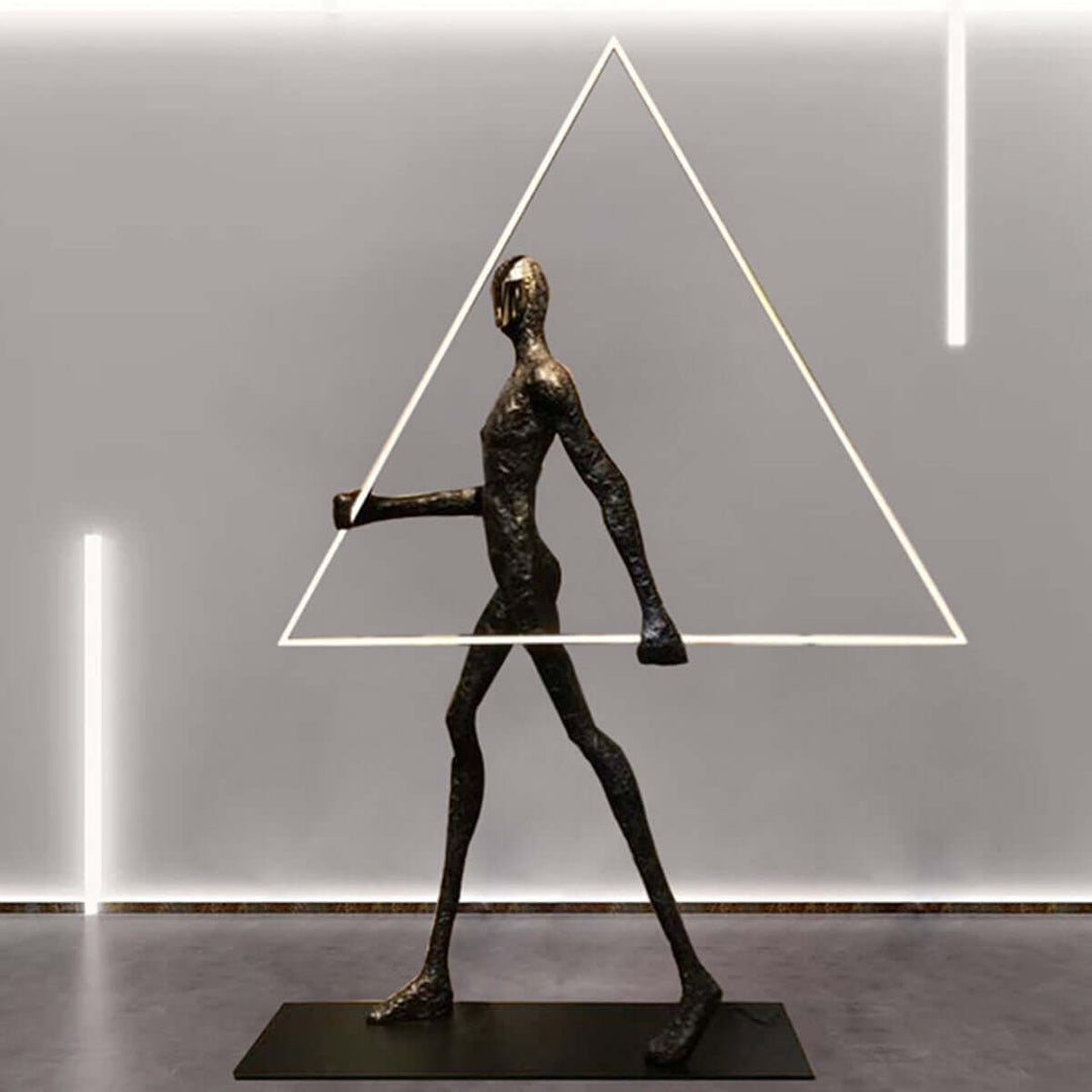 Tivoro Triangle Floor Lamp, a stylish art deco resin sculpture for modern living room decor.