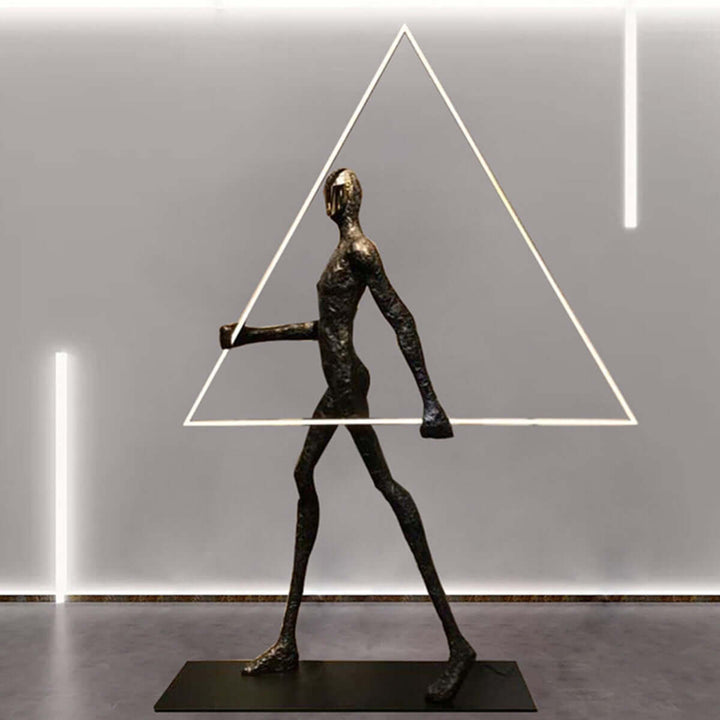 Tivoro Triangle Floor Lamp, a stylish art deco resin sculpture for modern living room decor.