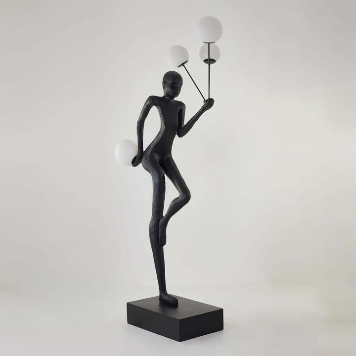 Varnilo sculptural floor lamp in black, art deco design, showcasing modern elegance for living room lighting.