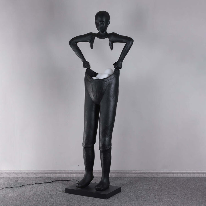 Sculptural floor lamp inspired by art deco style, perfect for living room lighting.