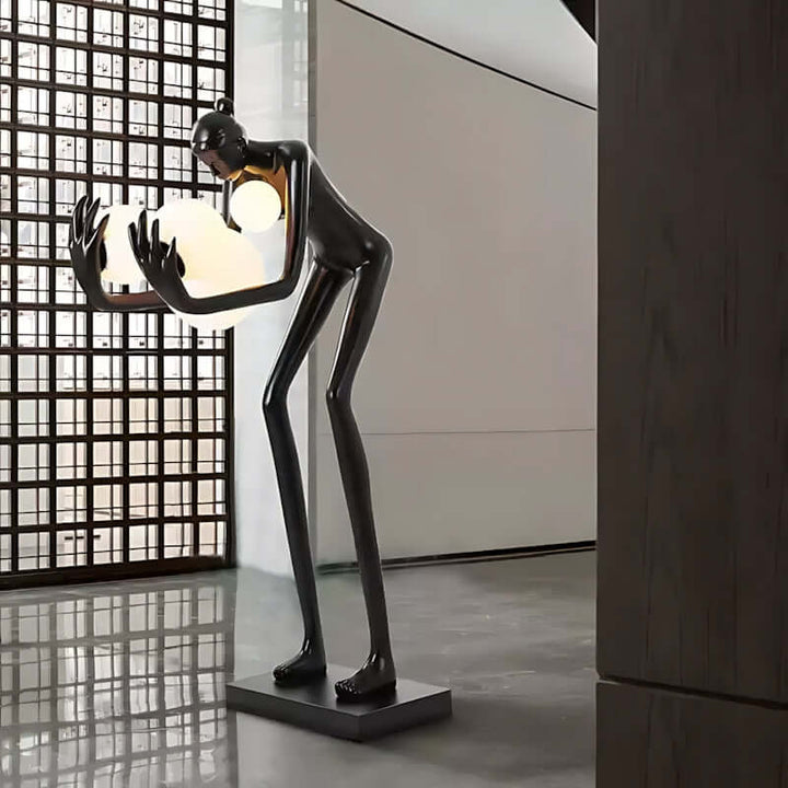 Velmora Sculptural Floor Lamp in modern living room, featuring resin sculpture art deco design and decorative ornaments.