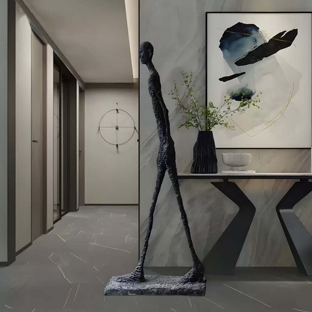 Vexumo Art Deco resin sculpture standing in a modern living room, enhancing decorative elegance and style.