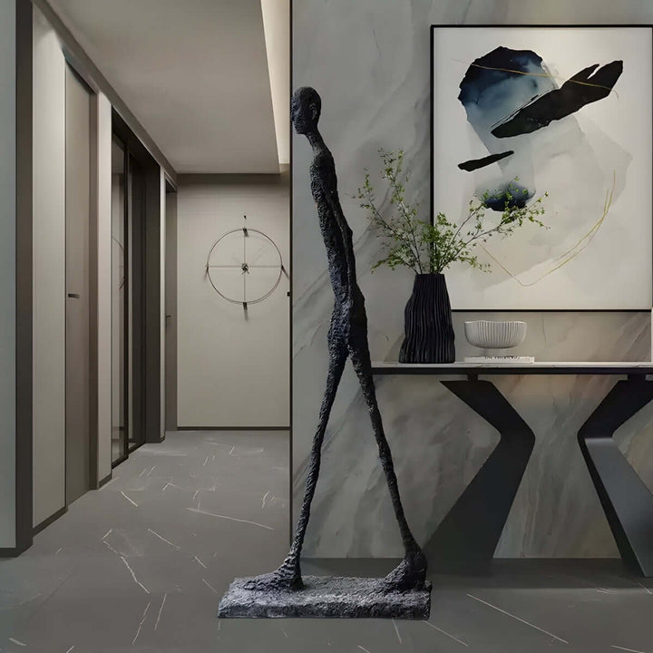 Vexumo Art Deco resin sculpture standing in a modern living room, enhancing decorative elegance and style.