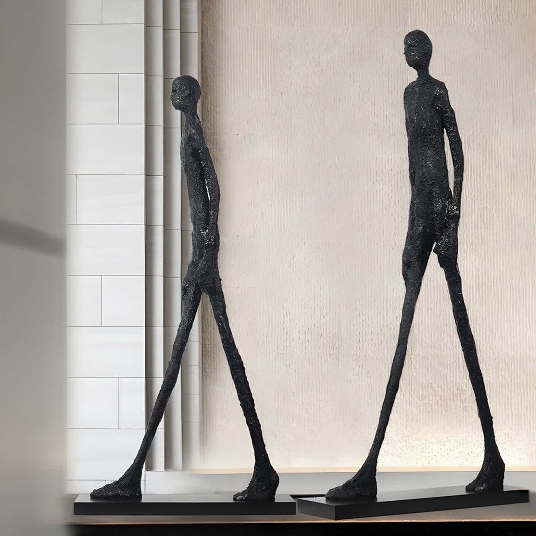 Vexumo Art Deco resin sculpture decorative ornaments for living room, featuring tall, slim figures.