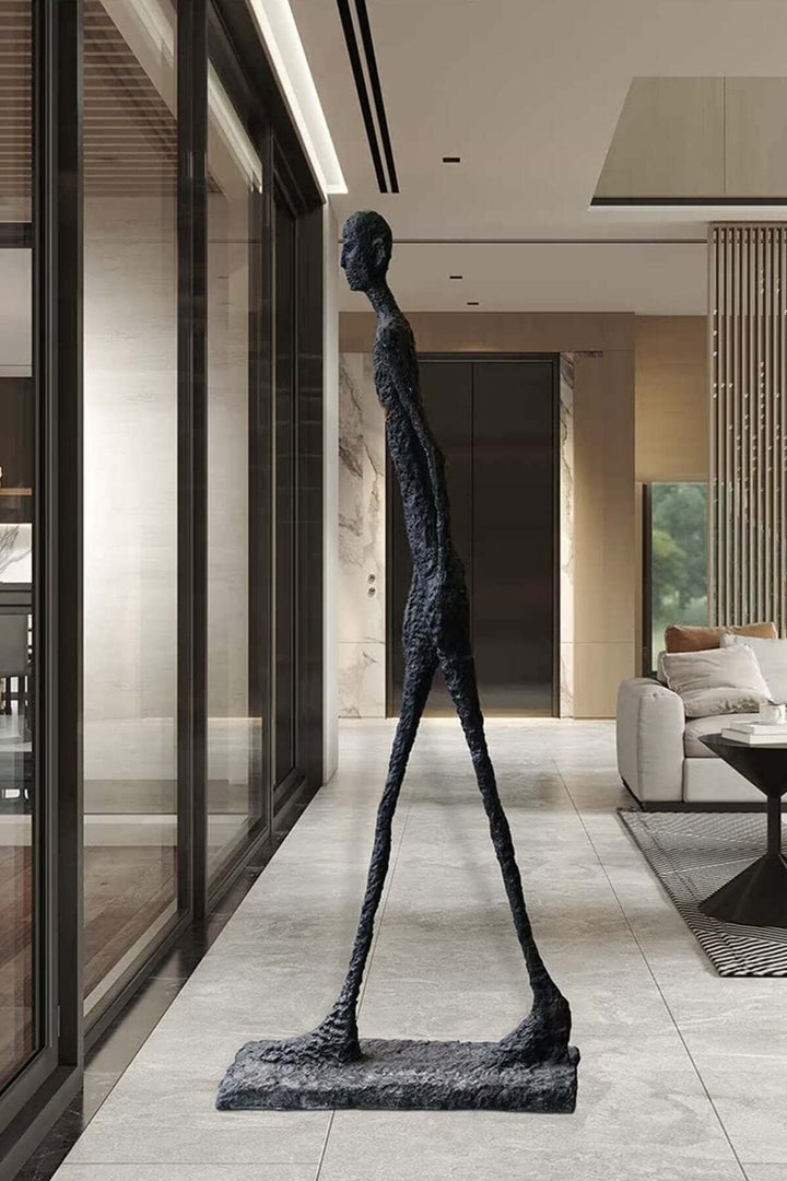 Vexumo art sculpture in a living room, showcasing a tall resin sculpture as a modern decorative ornament.