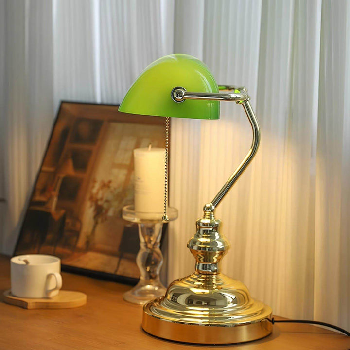 Vintage bankers table lamp with green shade, ideal as a traditional office table lamp featuring a pull chain.