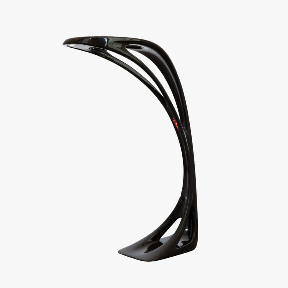 Sculptural floor lamp with a sleek design, perfect as an art deco accent in your living room lighting.