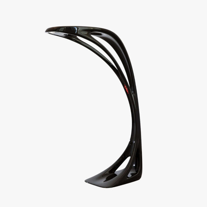 Sculptural floor lamp with a sleek design, perfect as an art deco accent in your living room lighting.