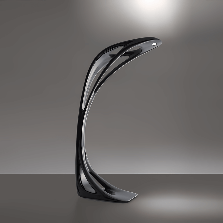 Sculptural floor lamp with a sleek black design, perfect as an art deco accent for living room lighting.