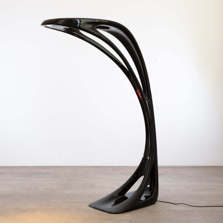 Sculptural art deco floor lamp, Vyntra, featuring modern design for stylish living room lighting.