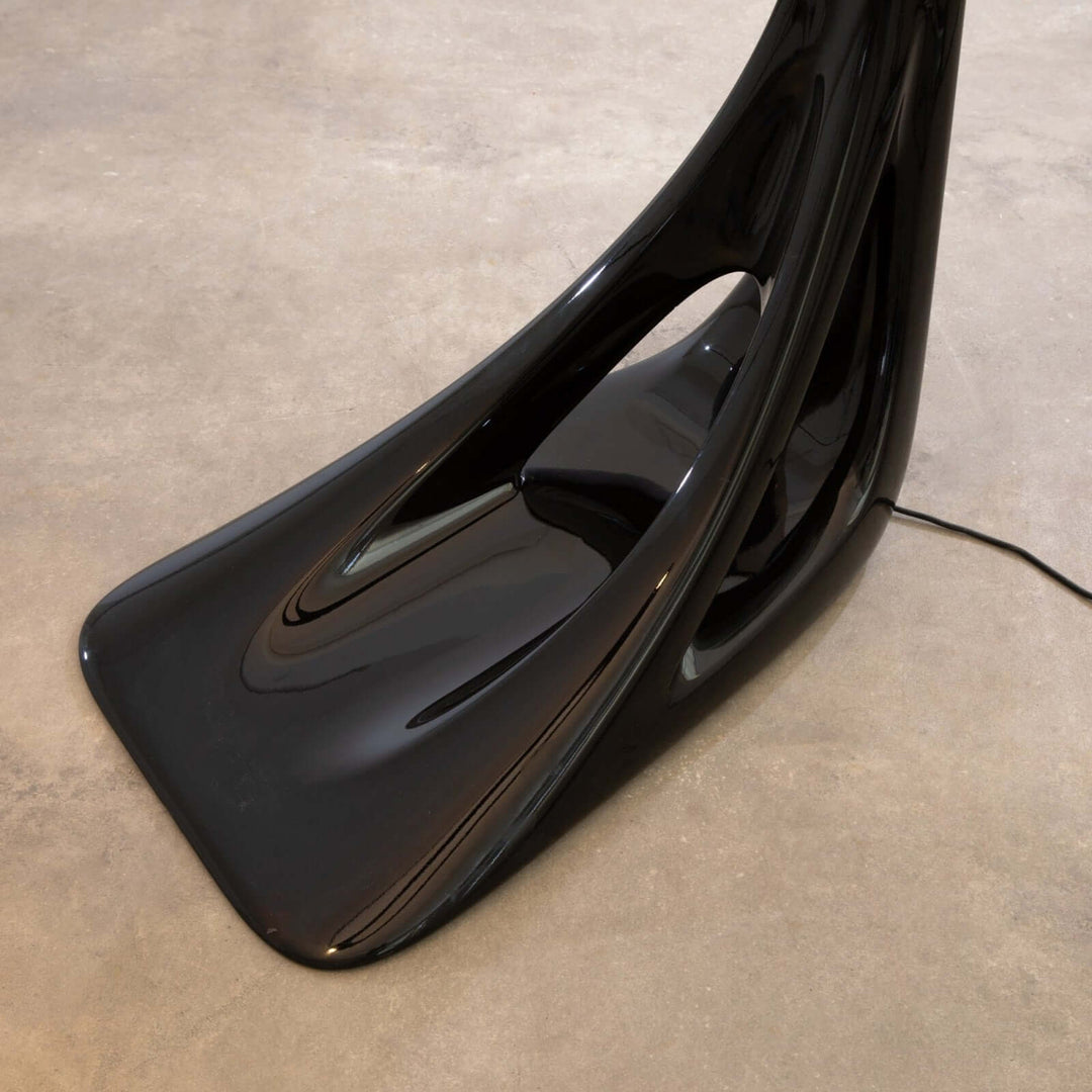 Sculptural black base of the Vyntra Floor Lamp, an art deco floor lamp for stylish living room lighting.