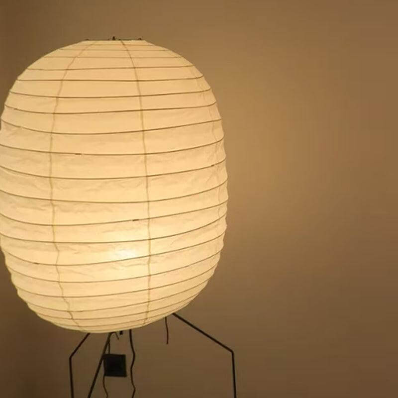 Decorative white Japanese paper floor lamp, tripod design, ideal for bedroom ambiance, soft light, and modern decor.