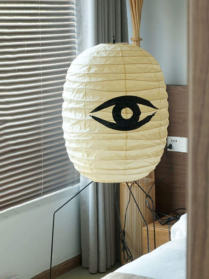 Decorative Washi paper floor lamp with eye design, perfect for bedrooms and living spaces, white tripod floor lamp.