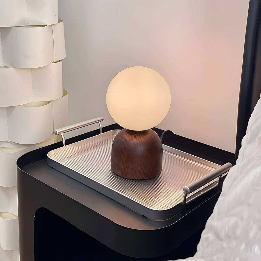 Wood Knuckle table lamp on a silver tray, showcasing modern design with vintage milk glass and minimalist aesthetics.