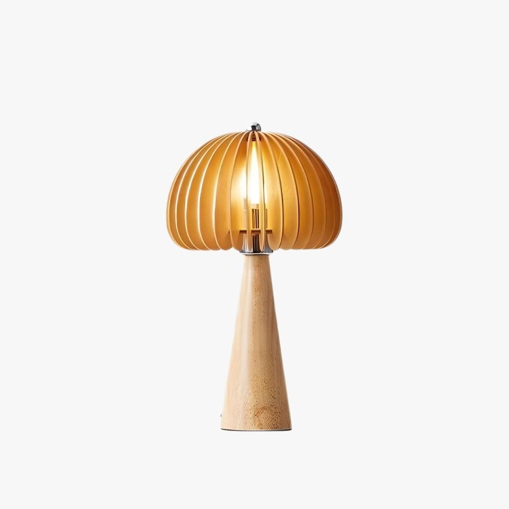 Wooden pumpkin table lamp with a rounded golden shade, adding warmth and style to any space.