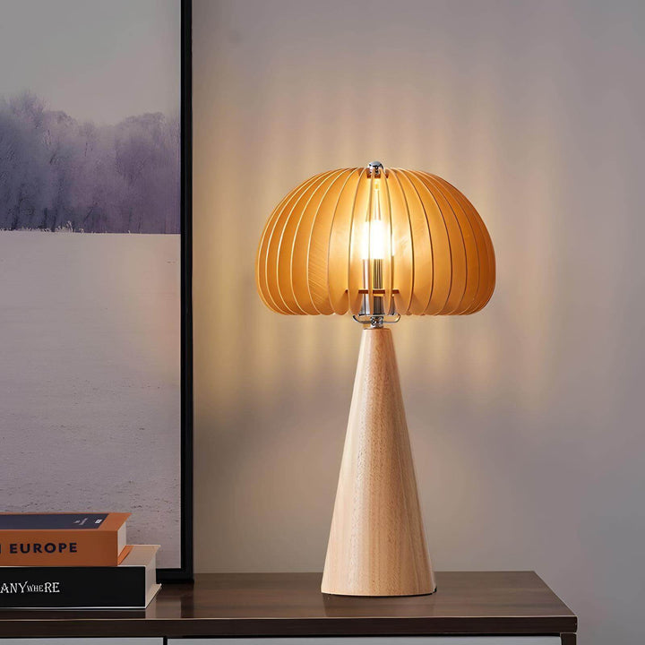 Wooden pumpkin table lamp with a round shade and base, perfect for adding warmth to any room.