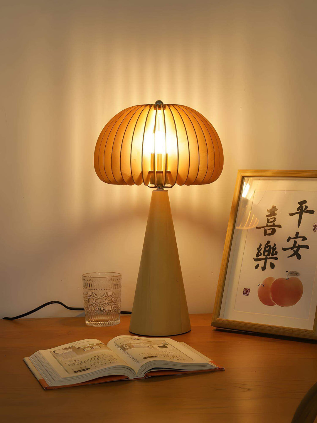 Wooden pumpkin table lamp illuminating a cozy reading nook, showcasing unique round design and warm light.