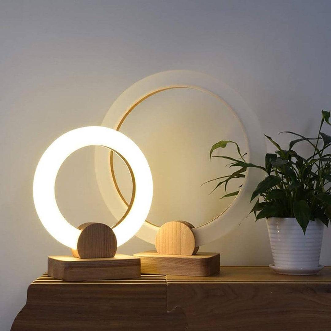 Calm Halo Table Lamp with wooden base, modern round design, ideal for minimal bedside decor.