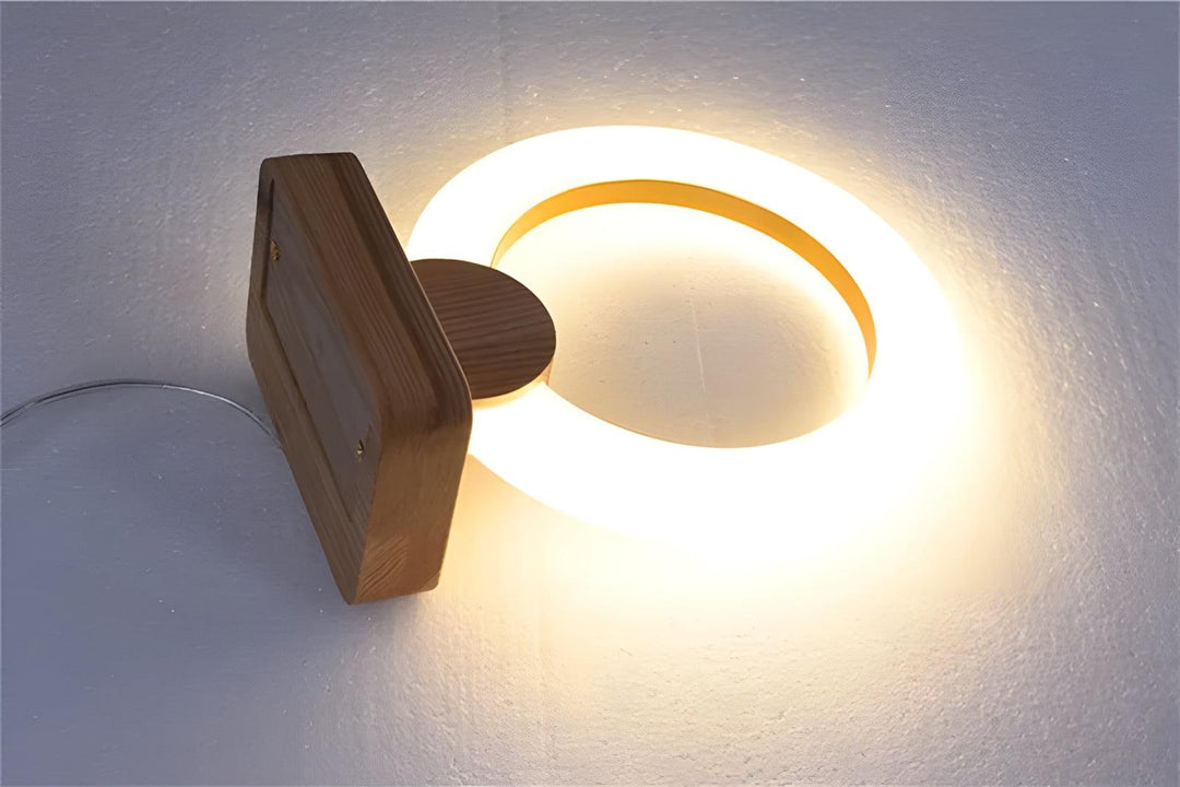 Calm Halo Table Lamp, a modern wood table lamp with a round design, perfect as a minimal bedside lamp.