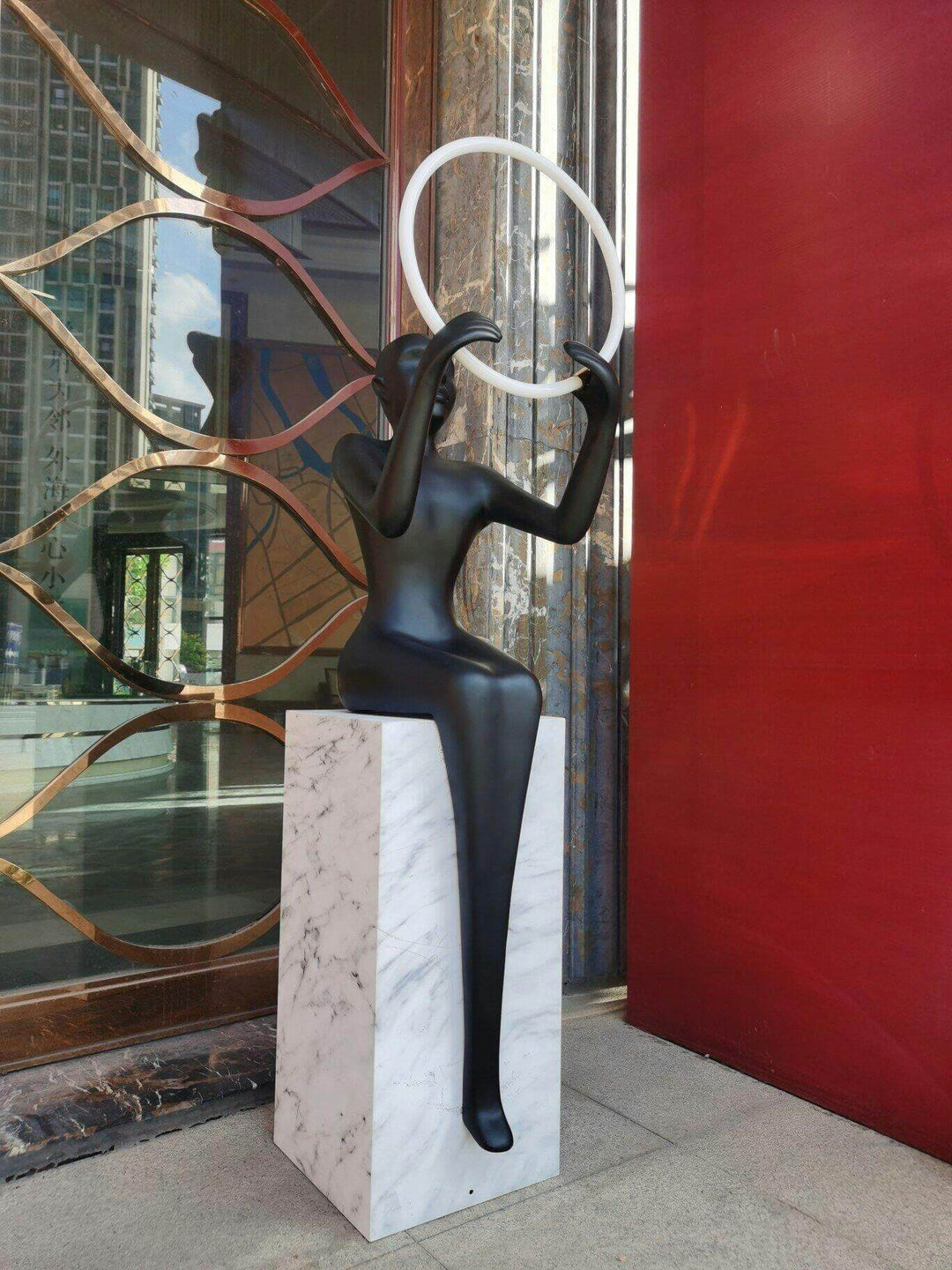 Zaytri sculptural floor lamp featuring resin sculpture, Art Deco style, ideal for living room decorations.