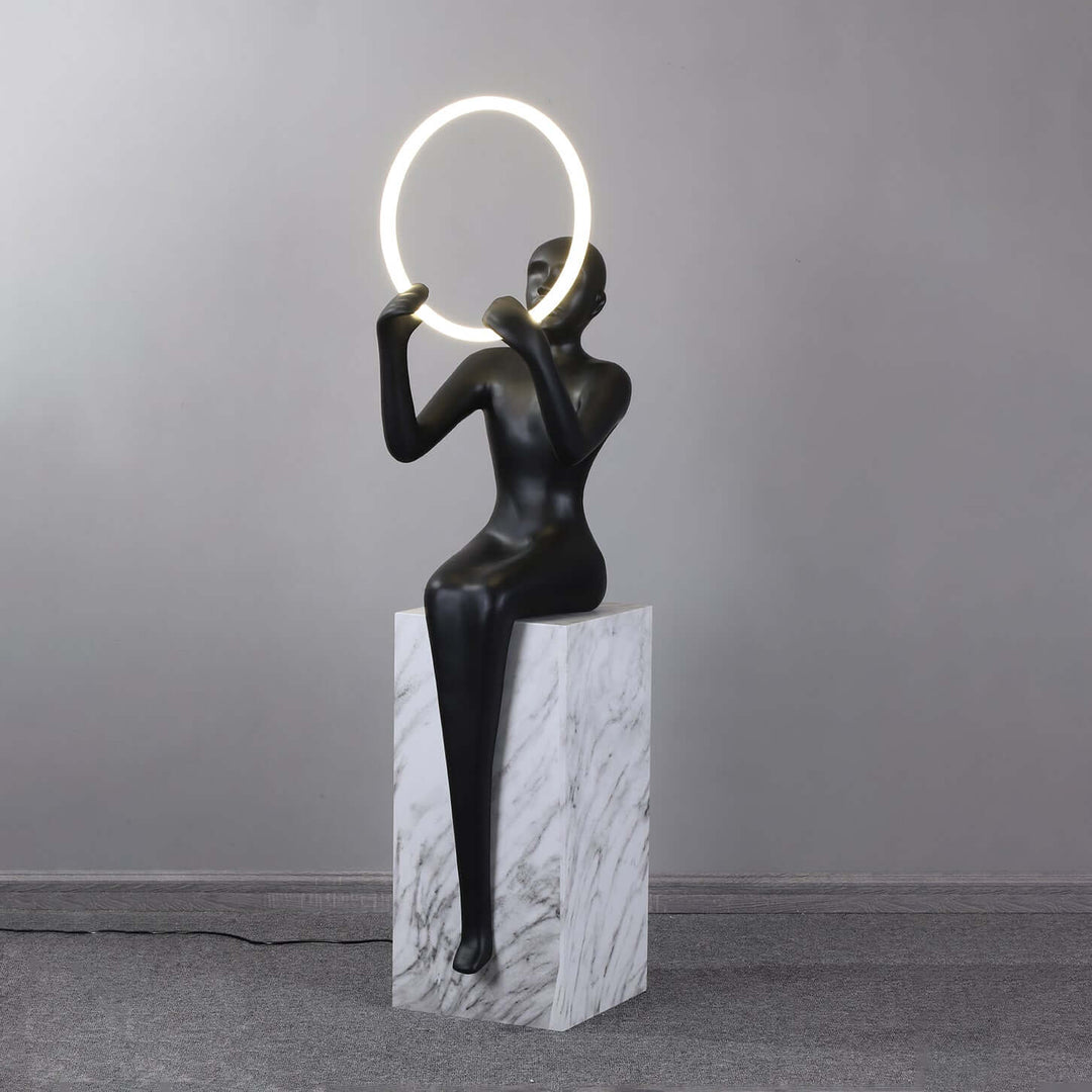 Zaytri Sculptural Floor Lamp featuring a resin sculpture with Art Deco design, ideal for living room decorations.