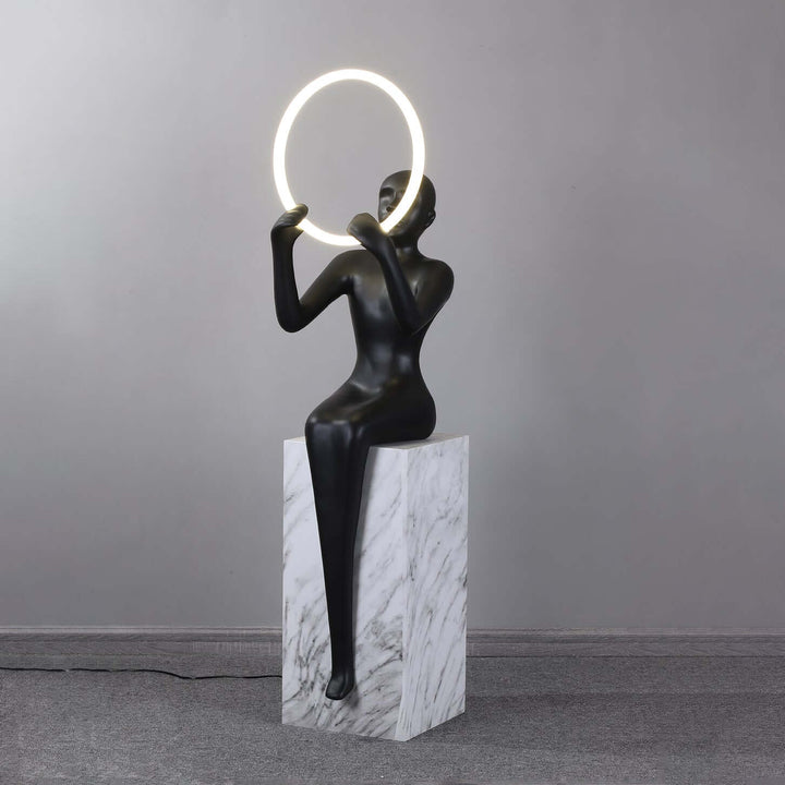 Zaytri Sculptural Floor Lamp featuring a resin sculpture with Art Deco design, ideal for living room decorations.