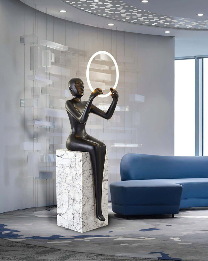 Zaytri Sculptural Floor Lamp in elegant living room, featuring resin sculpture and Art Deco style decor.