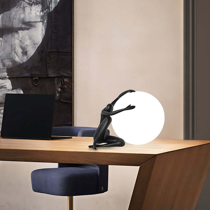 Zelvora sculptural table lamp on a modern desk, showcasing art deco design, ideal for living room lighting.