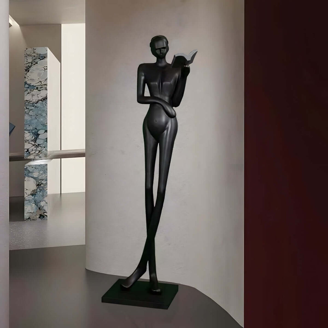 Zerima Sculpture: Elegant black resin sculpture, perfect for living room decorations with an Art Deco touch.