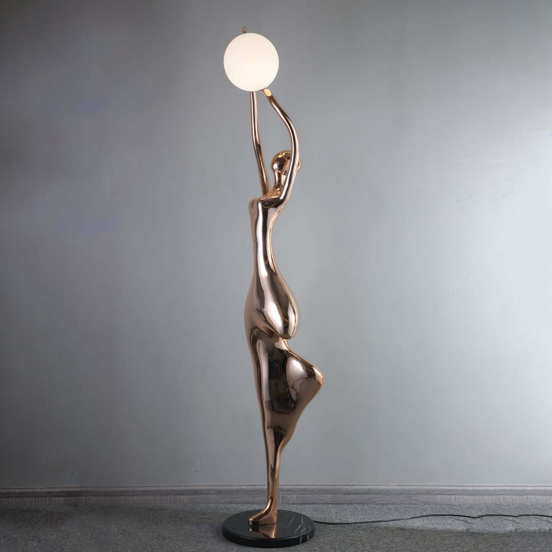Sculptural floor lamp in art deco style, featuring a tall, elegant design, ideal for living room lighting.