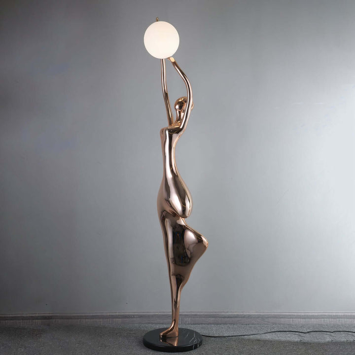 Sculptural floor lamp in art deco style, featuring a tall, elegant design, ideal for living room lighting.