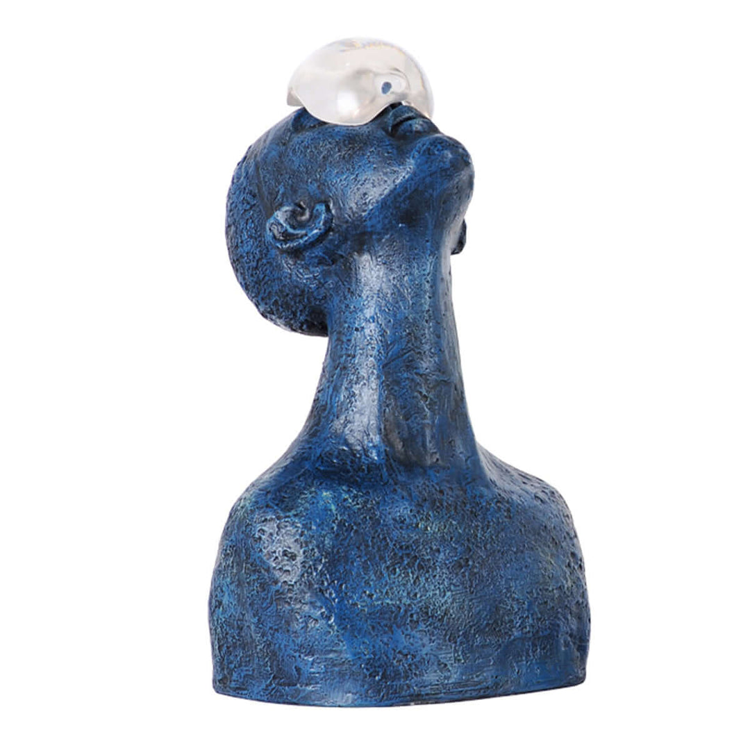 Zoreva resin sculpture featuring a blue abstract figure balancing a clear orb, ideal for living room Art Deco decor.