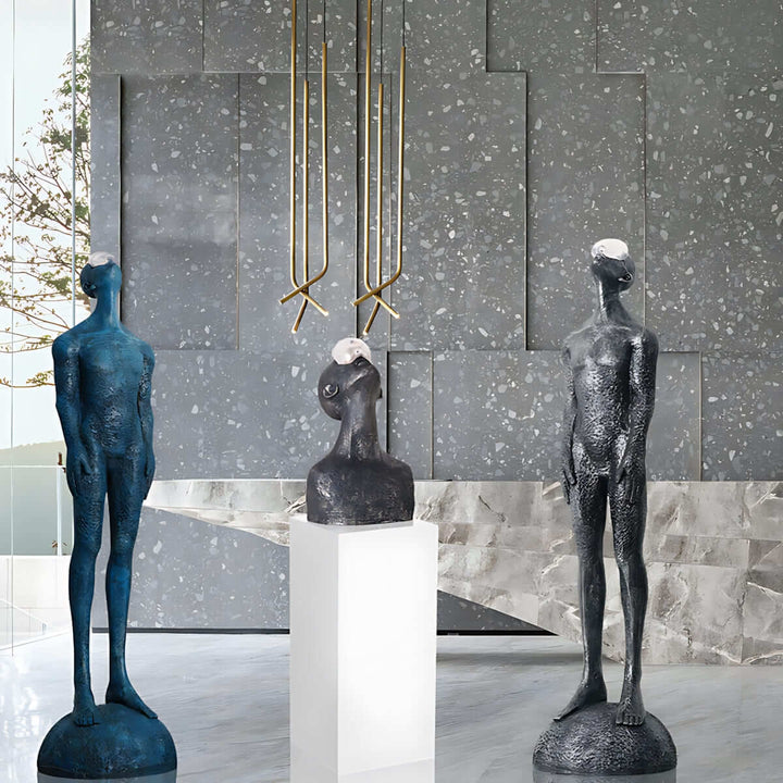 Contemporary resin sculptures displayed in a modern living room, showcasing Art Deco style decorative ornaments.